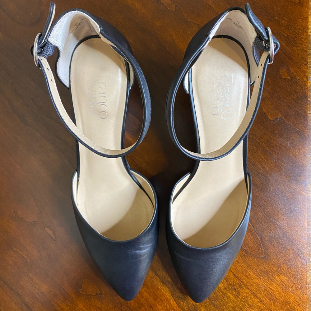 Black wedge heel shoes by Franco Sarto